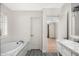 Large bathroom with a bathtub, vanity, sink, and marble countertops at 6231 E Calle Camelia --, Scottsdale, AZ 85251