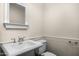Powder bathroom featuring a pedestal sink and traditional wainscoting at 6231 E Calle Camelia --, Scottsdale, AZ 85251
