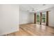 Bright bedroom with hardwood floors, recessed lighting, and glass patio doors at 6231 E Calle Camelia --, Scottsdale, AZ 85251