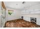 Home office complete with custom built-ins, brick floors, and doors leading to the outside at 6231 E Calle Camelia --, Scottsdale, AZ 85251