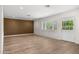 Bright and airy room with hardwood floors, and a view of the garden, filling the space with natural light at 6231 E Calle Camelia --, Scottsdale, AZ 85251