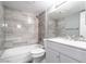 Bathroom featuring tub with shower and neutral gray tiled surround at 6240 N 16Th St # 40, Phoenix, AZ 85016