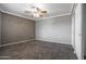 Bedroom with plush carpeting and large closets offers a quiet retreat for relaxation at 6240 N 16Th St # 40, Phoenix, AZ 85016