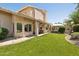Expansive backyard featuring lush lawn, a covered patio, and a gazebo is perfect for entertaining at 6828 E Evans Dr, Scottsdale, AZ 85254