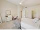 Bright bedroom with carpet, a ceiling fan, and ensuite access to a walk-in closet is ready for personalization at 6828 E Evans Dr, Scottsdale, AZ 85254