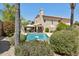 Private backyard oasis with a sparkling pool, shaded gazebo, lounge chairs, and mature landscaping at 6828 E Evans Dr, Scottsdale, AZ 85254