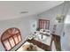 High angle showcasing open layout with living and dining spaces, accentuated by vaulted ceilings and natural light at 7053 S Heather Dr, Tempe, AZ 85283
