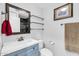 Modern bathroom featuring a vanity with storage, toilet, and shower at 706 E Washington St # 204, Phoenix, AZ 85034