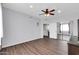 Expansive bedroom with a ceiling fan, wood floors, and large closet at 706 E Washington St # 204, Phoenix, AZ 85034