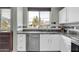 Kitchen view showcases stainless steel appliances and a window with neighborhood views at 706 E Washington St # 204, Phoenix, AZ 85034