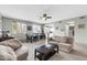 Bright, open-concept living and dining area, complete with neutral paint and tiled flooring at 706 E Washington St # 204, Phoenix, AZ 85034