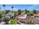 Expansive backyard, pristine lawn and mature palms beautifully accent this property, all framed by a mountain view at 7168 N Via De Amigos --, Scottsdale, AZ 85258