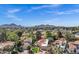 Beautiful neighborhood featuring lush landscaping, terra-cotta roofs, and private pools, all set against a scenic mountain backdrop at 7168 N Via De Amigos --, Scottsdale, AZ 85258