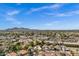 Expansive aerial shot displays the community, highlighting its landscape, nearby mountains, and beautiful neighborhood layout at 7168 N Via De Amigos --, Scottsdale, AZ 85258