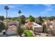 Lush greenery, a refreshing pool, and mountain views complement the home beautifully in this scenic aerial perspective at 7168 N Via De Amigos --, Scottsdale, AZ 85258