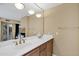 Bathroom featuring double vanity with white countertops and decorative lighting at 7168 N Via De Amigos --, Scottsdale, AZ 85258