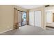 Bedroom with neutral walls and carpeting plus large glass sliding door and walk-in closet at 7168 N Via De Amigos --, Scottsdale, AZ 85258