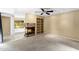 Bedroom with ceiling fan, fireplace, custom shelving and natural light at 7168 N Via De Amigos --, Scottsdale, AZ 85258
