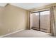 Bedroom with large sliding glass door to patio, neutral paint, and carpeting at 7168 N Via De Amigos --, Scottsdale, AZ 85258