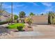 Charming single-story home with a two-car garage, mature landscaping, and a well-manicured lawn at 7168 N Via De Amigos --, Scottsdale, AZ 85258
