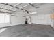 Spacious and clean two-car garage featuring ample shelving, storage, and a well-lit interior at 7168 N Via De Amigos --, Scottsdale, AZ 85258