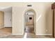 Arched doorway leading to a room with a ceiling fan and tiled flooring at 7168 N Via De Amigos --, Scottsdale, AZ 85258