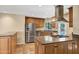 Spacious kitchen with stainless steel appliances, granite countertops and a center island at 7168 N Via De Amigos --, Scottsdale, AZ 85258