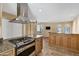 Modern kitchen featuring granite countertops, stainless steel appliances, and tile flooring at 7168 N Via De Amigos --, Scottsdale, AZ 85258