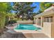 Inviting backyard pool surrounded by mature landscaping, creating a private oasis for relaxation and enjoyment at 7168 N Via De Amigos --, Scottsdale, AZ 85258