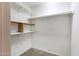 Bright walk-in closet with shelving and ample storage space for organization at 7168 N Via De Amigos --, Scottsdale, AZ 85258