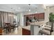 Stylish kitchen with stainless steel appliances open to the dining area at 8205 S Pioneer Ct, Gold Canyon, AZ 85118