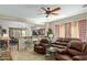 Comfortable living room area features tile flooring and an open concept design at 8205 S Pioneer Ct, Gold Canyon, AZ 85118