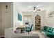 Bright study area features a desk, bookshelf, and comfortable sofa at 8205 S Pioneer Ct, Gold Canyon, AZ 85118