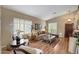 Well-lit living room showcasing hardwood floors and tasteful decor at 9706 E Sheena Dr, Scottsdale, AZ 85260