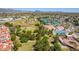 An aerial view of community athletic facilities, including baseball fields, tennis courts, and basketball courts at 10015 E Mountain View Rd # 2010, Scottsdale, AZ 85258