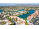 An aerial view of a beautiful waterfront community with lush landscaping and mountain views at 10015 E Mountain View Rd # 2010, Scottsdale, AZ 85258
