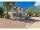 Charming two-story home with well-manicured landscaping at 10865 E Florian Ave, Mesa, AZ 85208