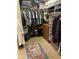 Spacious walk-in closet with ample shelving and clothing racks at 10980 E Winchcomb Dr, Scottsdale, AZ 85255