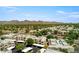 Expansive aerial view of the community, showcasing its desert landscaping and mountain backdrop at 11260 N 92Nd St # 2023, Scottsdale, AZ 85260