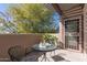 Relaxing balcony with a table and chairs, perfect for enjoying the outdoors at 11260 N 92Nd St # 2023, Scottsdale, AZ 85260