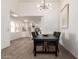 Open-concept dining room featuring a contemporary chandelier, sleek furniture and a spacious feel at 11260 N 92Nd St # 2023, Scottsdale, AZ 85260