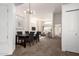 Bright open-concept living room and dining area with modern lighting and neutral color palette at 11260 N 92Nd St # 2023, Scottsdale, AZ 85260
