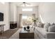 Bright living area with a fireplace and sliding doors to a balcony at 11260 N 92Nd St # 2023, Scottsdale, AZ 85260