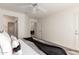 Cozy main bedroom with a view of the dining area through the open doorway at 11260 N 92Nd St # 2023, Scottsdale, AZ 85260