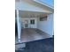 Attached carport providing covered parking and direct access to the home's front entrance at 13807 N Garden Ct Dr, Sun City, AZ 85351