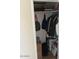 Inside closet containing clothes, boxes, and personal belongings at 13807 N Garden Ct Dr, Sun City, AZ 85351