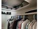 Organized closet with ample storage space for clothing and accessories at 13807 N Garden Ct Dr, Sun City, AZ 85351