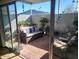Cozy patio with comfortable seating and garden decorations at 13807 N Garden Ct Dr, Sun City, AZ 85351