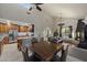 Spacious dining area featuring a skylight and open access to the kitchen and living room at 1422 E Royal Palm Rd, Phoenix, AZ 85020