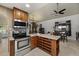 Well-equipped kitchen featuring stainless steel appliances and a center island at 1422 E Royal Palm Rd, Phoenix, AZ 85020